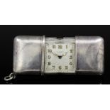 A 1930s Movado silver rectangular cased pocket watch, No. 1210410, the plain silvered dial with