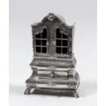 An early 20th Century Dutch silver "Toy" modelled in the form of a miniature armoire with shaped top