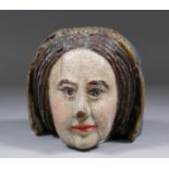 A 17th/18th Century carved oak head of the Virgin (?), painted in naturalistic colours, French