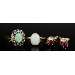 An early 20th Century 18ct gold opal and diamond ring, the oval cabochon cut opal approximately 1ct,