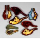 Five Meerschaum cheroot holders, including - Girl playing a mandolin with amber stem, 4.5ins, seated