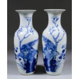 A pair of late 19th/early 20th Century Chinese blue and white porcelain baluster shaped vases in the