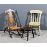 A late Victorian child's inlaid walnut and cane seated folding occasional chair, the shaped crest