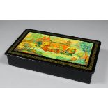 A 20th Century Russian black papier-mache and painted box, the lid with a horse-drawn sleigh