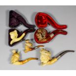 Five Meerschaum pipes and cheroot holders, including - "Kaiser Bill" with amber stem, 4.5ins (