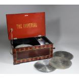 A late 19th Century "The Imperial" Polyphon to take 9.125ins metal disks, with 3.5ins steel single