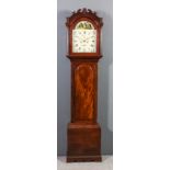 An early 19th Century figured mahogany longcase clock by Roberts of Charing, the 12ins arched