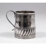 A William III silver mug with moulded rim, the slightly tapered body with reeded girdle and fluted
