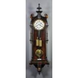 A late 19th Century Continental grained wood cased "Vienna Regulator" retailed by J.W. Benson,