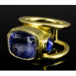 A modern gold coloured metal mounted blue topaz set ring, the face with large rectangular cut