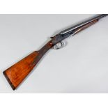 A 12 bore side by side side lock shotgun by Brno, Serial No. 1009943-79, the 28.5ins blued steel