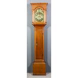 An 18th Century oak longcase clock by John Nash of Bridge, the 12ins arched brass dial with wide