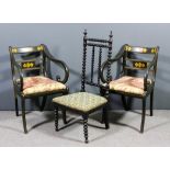 A pair of green painted open armchairs of Regency design, decorated in gilt with leaf ornament,