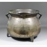 A 17th Century bronze two-handled cauldron of large size, the body with raised maker's mark,