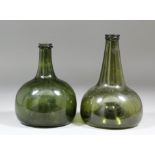 Two early18th Century Dutch green glass onion shaped wine bottles, 8ins and 7.25ins high (circa