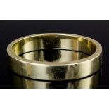 A modern 14ct gold stiff pattern bangle (gross weight 35.4 grammes)