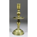 A 17th Century Dutch copper alloy candlestick of "Heemskirk" type, the shaft with central drip