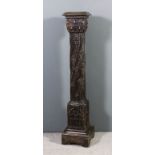 A 15th Century French column, the sides carved with tracery, pecton shells, stars and fleur-de-