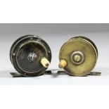 A Hardy Bros brass 2.5ins fishing reel (stamped "Hardy Bros, Alnwick" and trade mark to back), and