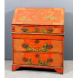 An early 20th Century red japanned bureau, the whole painted and decorated in gilt with