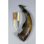 A 19th Century powder horn with a pair of steel rings for suspension and brass nozzle, 12ins long,