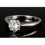 A modern 18ct white gold mounted diamond solitaire ring, the brilliant cut stone approximately .75ct