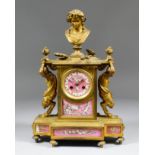 A 19th Century French ormolu and porcelain mounted mantel clock, No. 233, the 2.75ins diameter