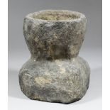 An unusual limestone basin, possibly a mortar or stoup, 6.25ins square (at base) x 8.25ins high