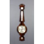 A 19th Century mahogany cased wheel barometer and thermometer by Fragich & Son, Great Warner Street,