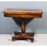 An early Victorian mahogany rectangular card table with rounded front corners, with plain baize