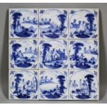 A set of nine 18th Century English blue and white Delft tiles of figures in landscapes, each 5.25ins