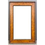 A 19th Century burr walnut framed rectangular wall mirror, the deep frame with bead mounts and inset