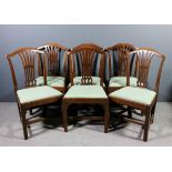 A set of six 1920's mahogany dining chairs of Hepplewhite design with arched crest rails and fretted