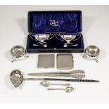 A pair of Edward VII silver ovoid two-handled salts with scroll handles and oval footrims, 4.5ins