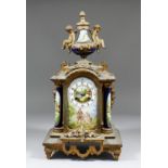 A late 19th Century French gilt spelter and porcelain mounted mantel clock, the porcelain dial