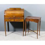 An Edwardian lady's mahogany cylinder bureau inlaid with stringings, the slope opening to reveal