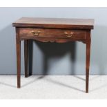 An 18th Century "Cuban" mahogany rectangular tea table with plain folding top, fitted one frieze