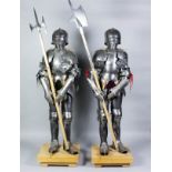 A pair of late 19th/early 20th Century miniature Gothic suits of armour of late 15th Century