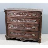 A 19th Century Continental oak chest, the whole boldly carved with birds, leaf scroll ornament and