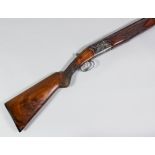 A rare 12 bore over and under shotgun by Webley & Scott, manufactured by Beretta as an attempt to