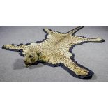 An early 20th Century leopard skin rug with mounted head by Van Ingen & Van Ingen of Mysore, the