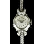 A 1960s lady's 18K white gold Fortis cocktail watch, the silvered dial with baton numerals,