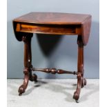 An early Victorian mahogany oval sofa table, the figured veneered top with moulded edge, fitted