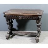A 19th Century carved "Black Oak" octagonal centre table, the plain top with carved and moulded edge