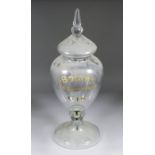 A Victorian glass urn shaped spirit dispensing urn and cover, the cover panel cut and with