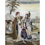 A 19th Century needlework picture of an Eastern scene with a bearded gentleman, lady and child on