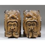 A pair of rare 14th Century English oak heads with divided tongues, each 6.5ins x 4ins x 2ins deep