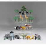 A collection of painted lead zoo animals, figures and fencing, various makes (some playworn)