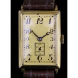 A gentleman's 18ct gold Swiss Longines wristwatch, the rectangular gilt dial with Arabic numerals