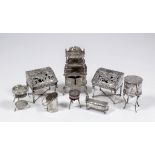 Two late 19th Century Dutch silver "Toys" modelled in the form of a bureau, the slopes cast with